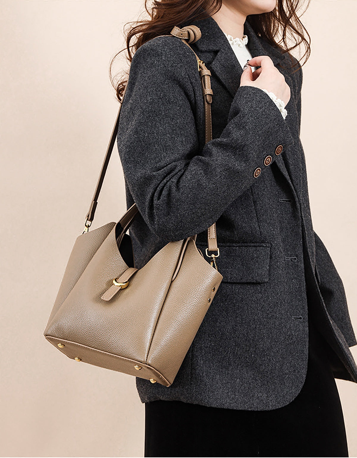 Lifestyle—leather bucket bag styled with a blazer
