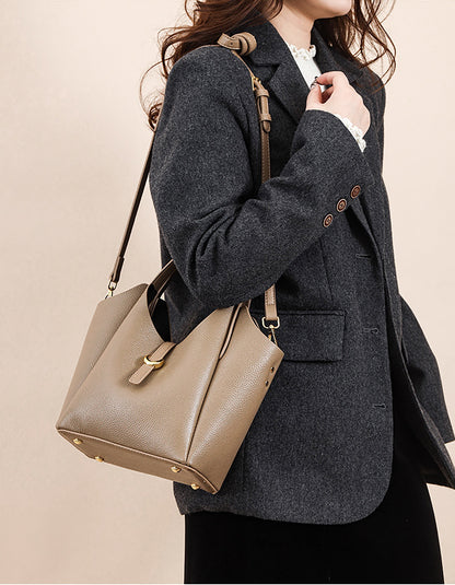 Lifestyle—leather bucket bag styled with a blazer