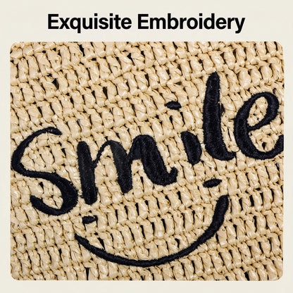 Smile embroidery design on handwoven tote bag