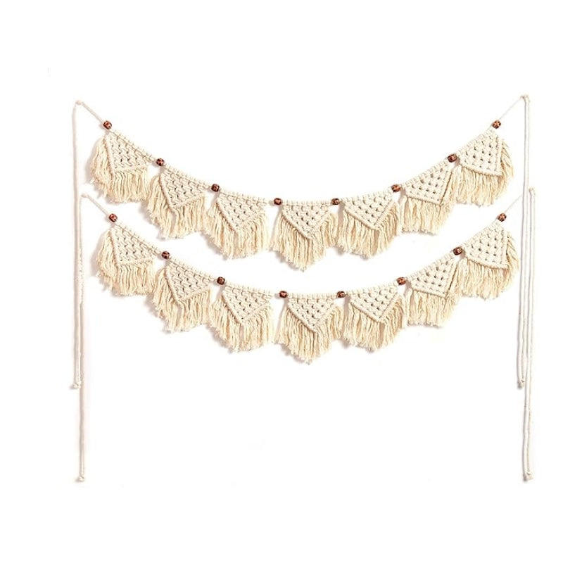 Eiyye 7-flag handmade macrame tassel garland in beige hung on wall