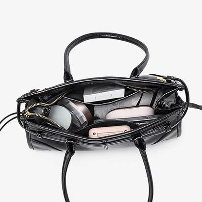 Eiyye Black Leather Boston Handbag Overhead View Featuring Roomy Capacity for Phone, Wallet, and Everyday Items
