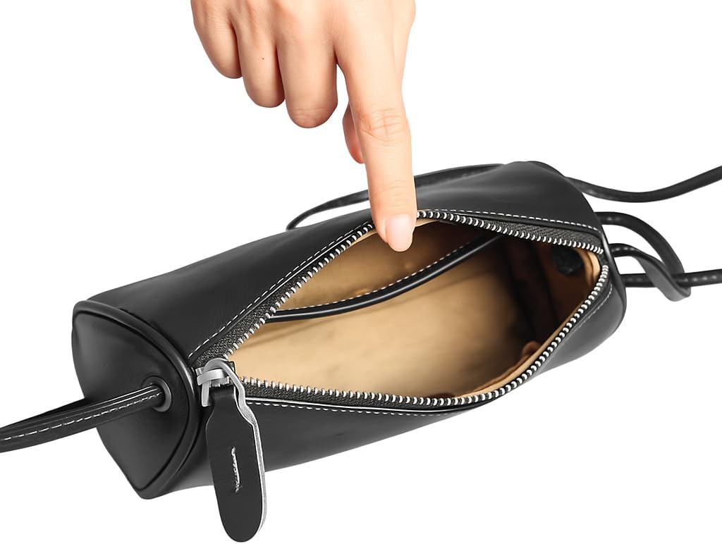 Black Leather Crossbody Bag interior featuring a neat lined compartment