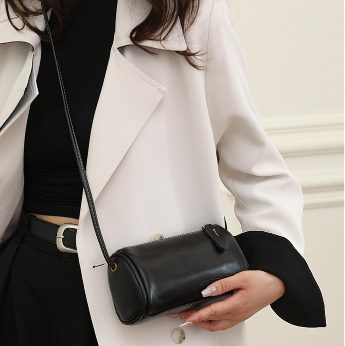 Black Leather Crossbody Bag worn crossbody with a polished silhouette and relaxed elegance for outings and casual looks