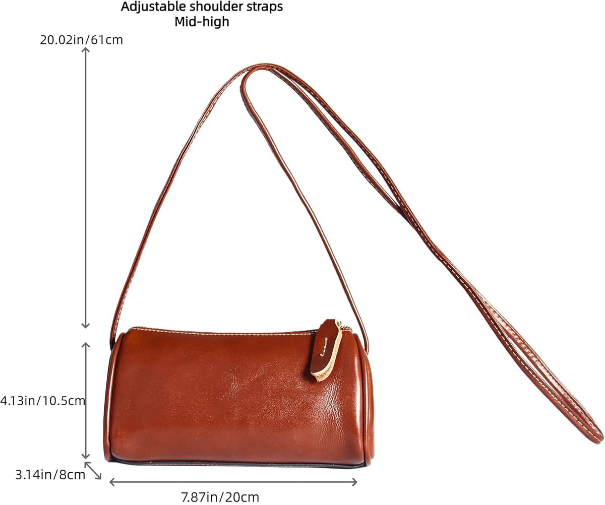 Crossbody Bag measurement view highlighting its compact cylinder shape with a 7.87 × 3.14 × 4.13 inch profile