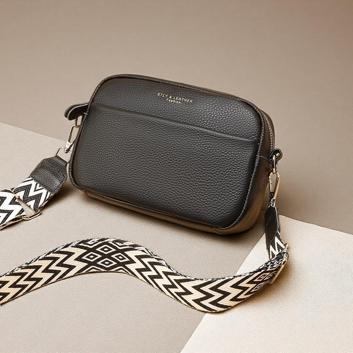 Black Small Crossbody Bag close-up featuring a sleek leather finish and structured mini design