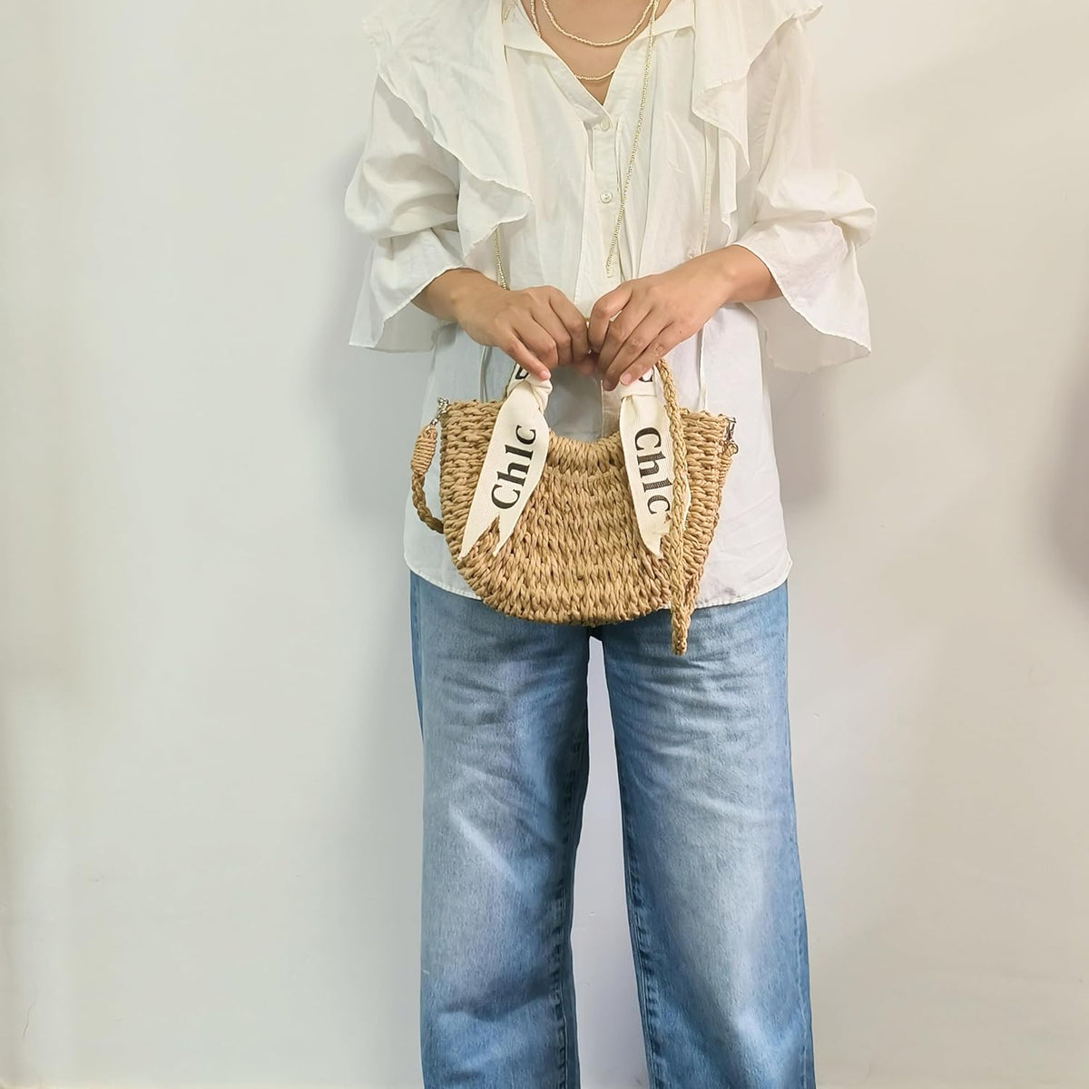 Eiyye Off White Woven Straw Shoulder Bag Hand Carried for a Sophisticated Summer Fashion Look